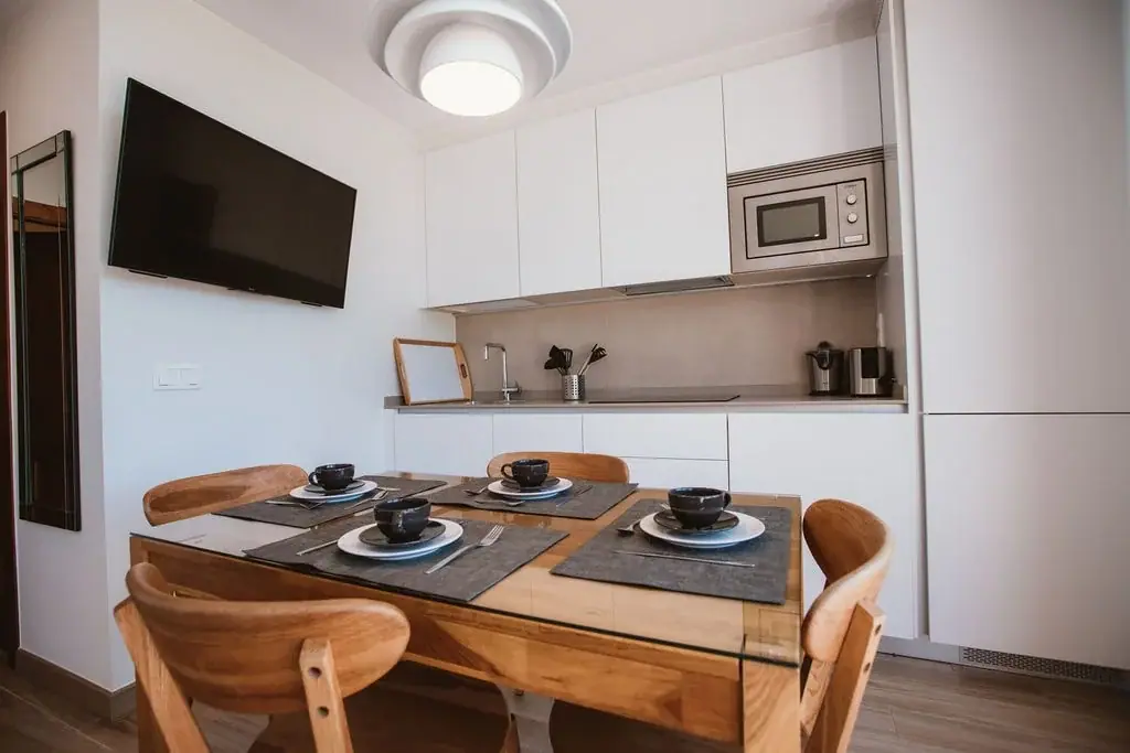Kitchen and dining area of a Standard apartment