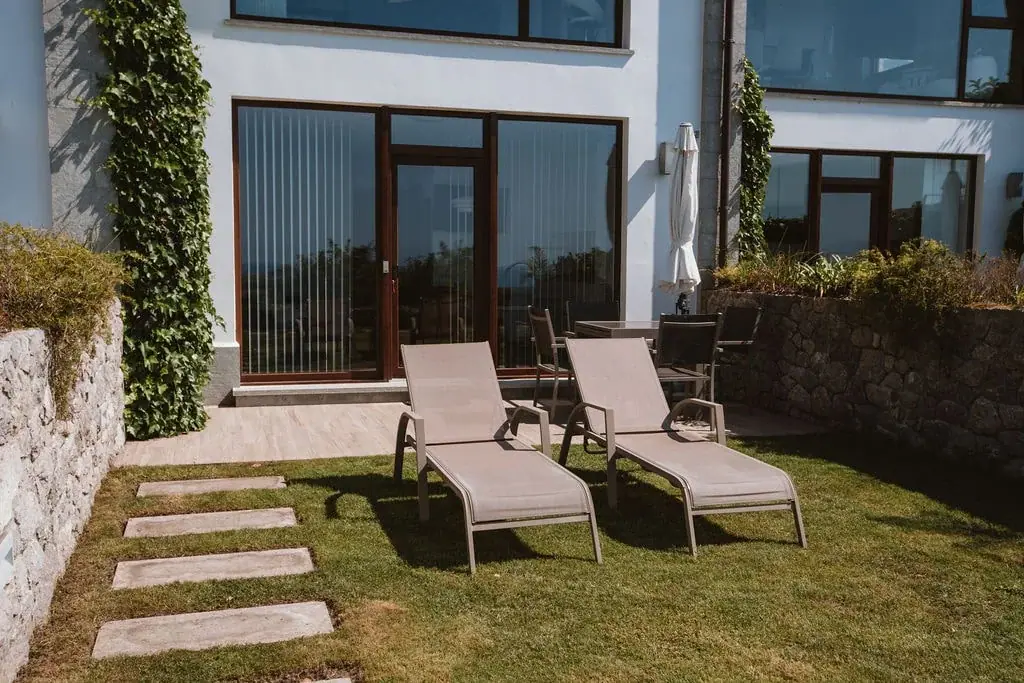 Sun loungers on the garden terrace of a Standard apartment