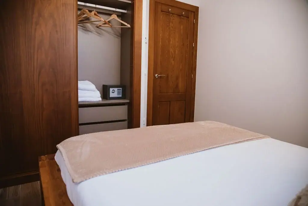 Bedroom with a wardrobe in a Standard apartment