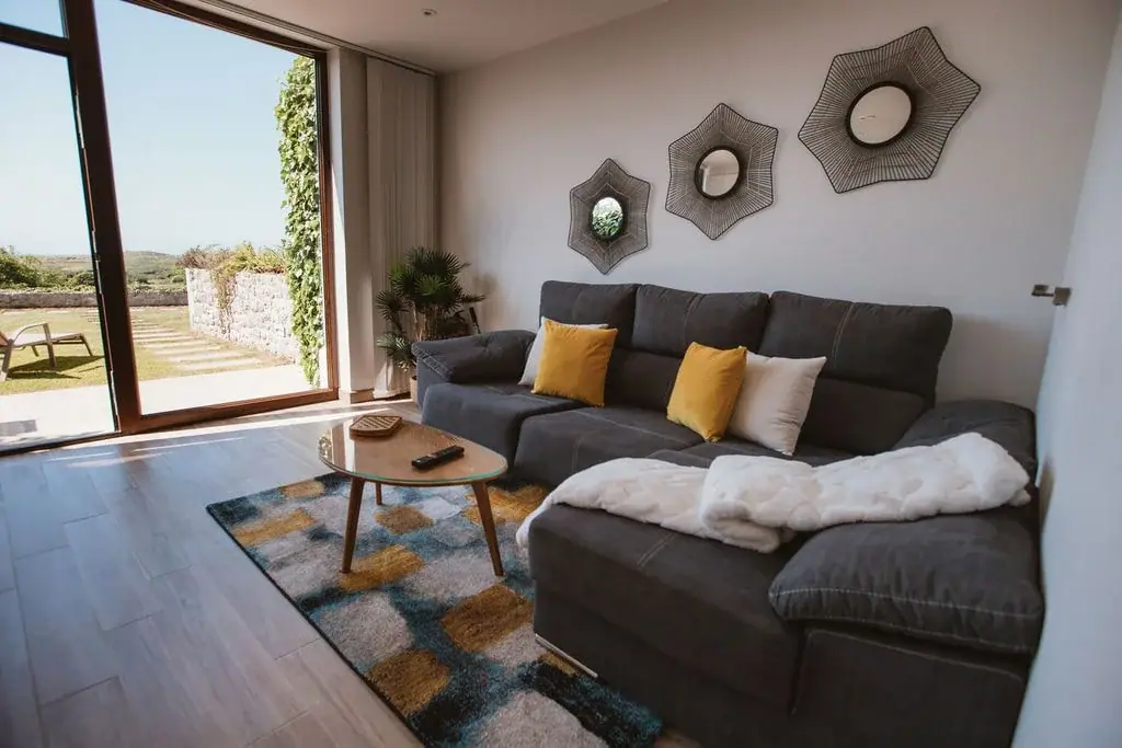 Living room of a Standard apartment, opening onto the garden