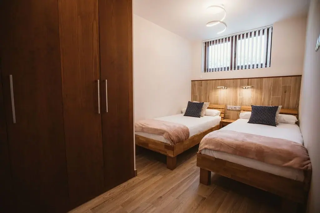 Twin bedroom and wardrobe in a Standard apartment