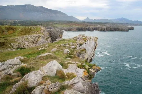 Limestone cliffs with the mountains behind
