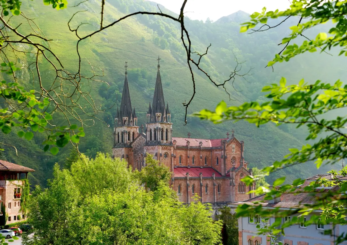 The Basilica of Covadonga among the trees