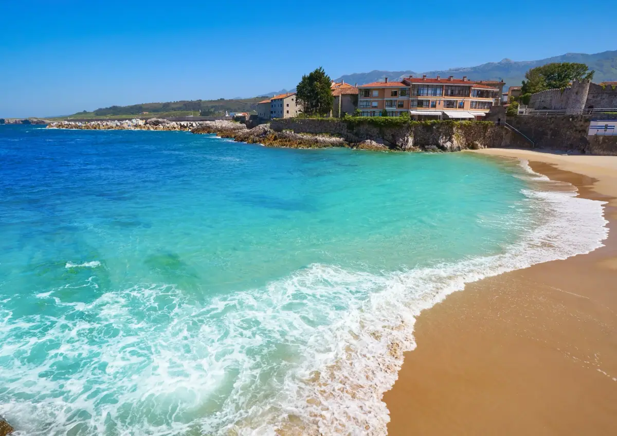 A sandy beach with turquoise water
