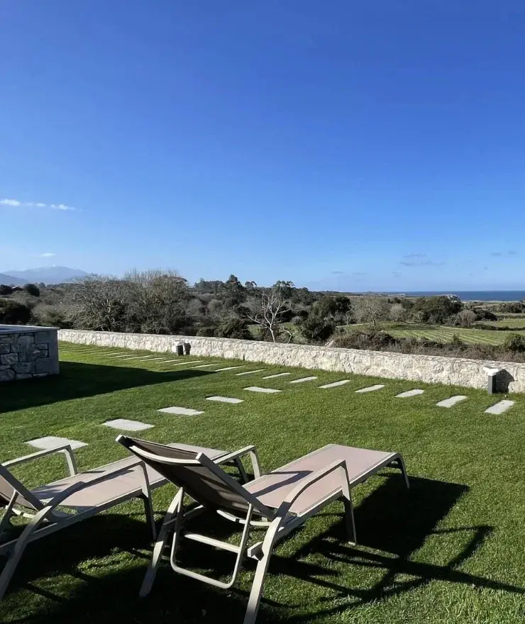 Private garden with sun loungers and sea views