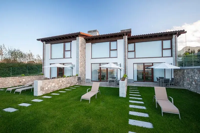 Front of the apartments with terraces and garden